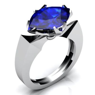 Золотое кольцо с топазом Swiss Blue R774